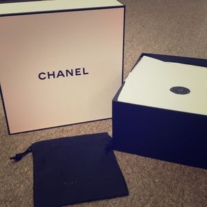 Chanel gift box and drawstring makeup pouch.